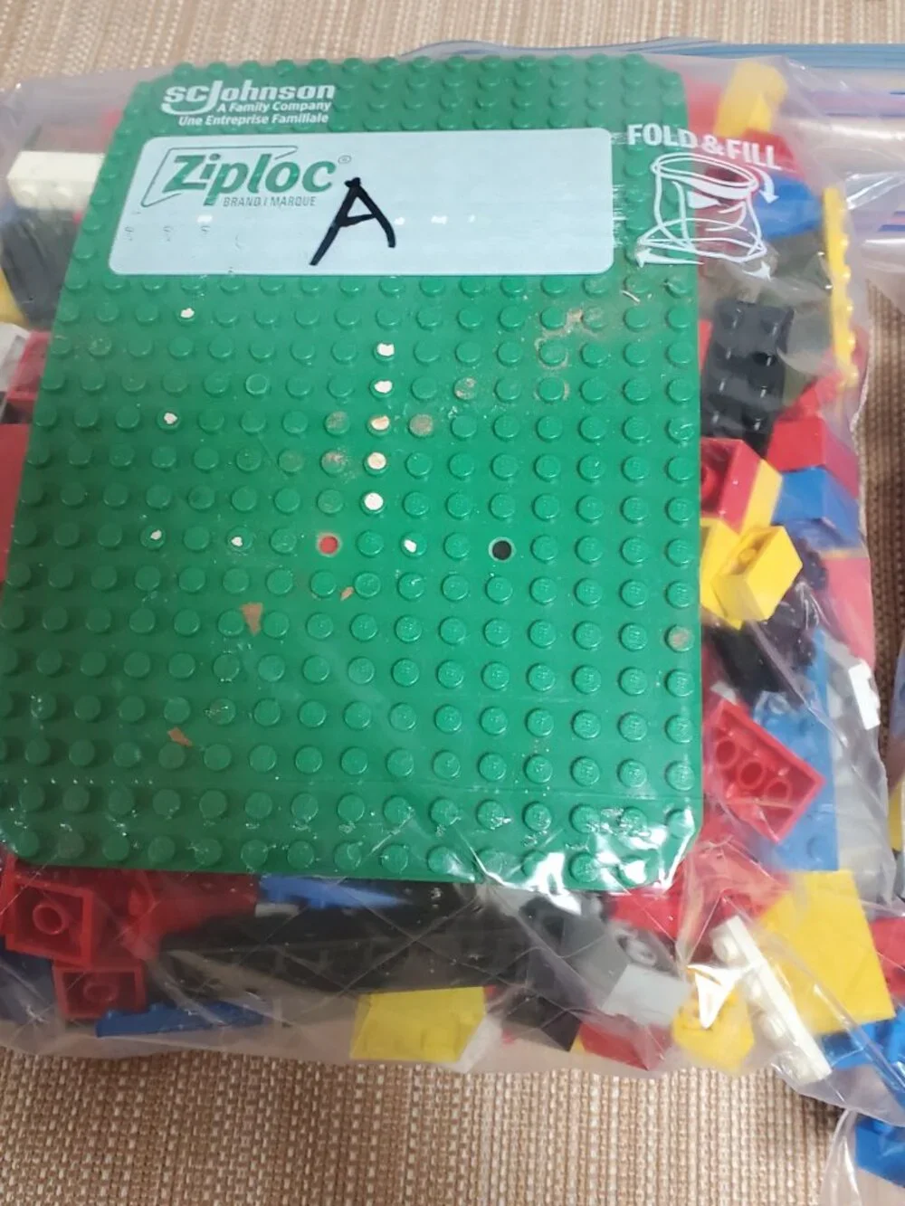 Lot of four pounds of assorted legos. Most from 1999-2009